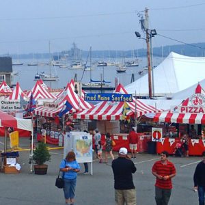The festival grounds with the harbor in the background